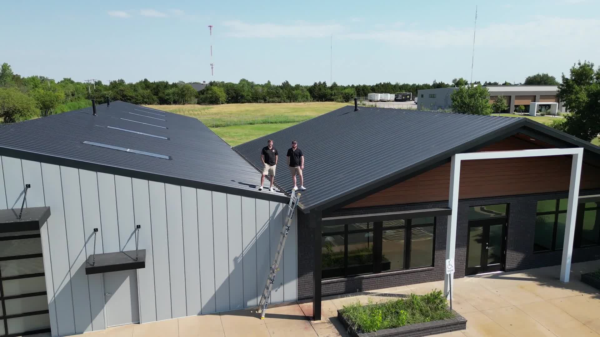 RedZone team on a completed commercial metal roof